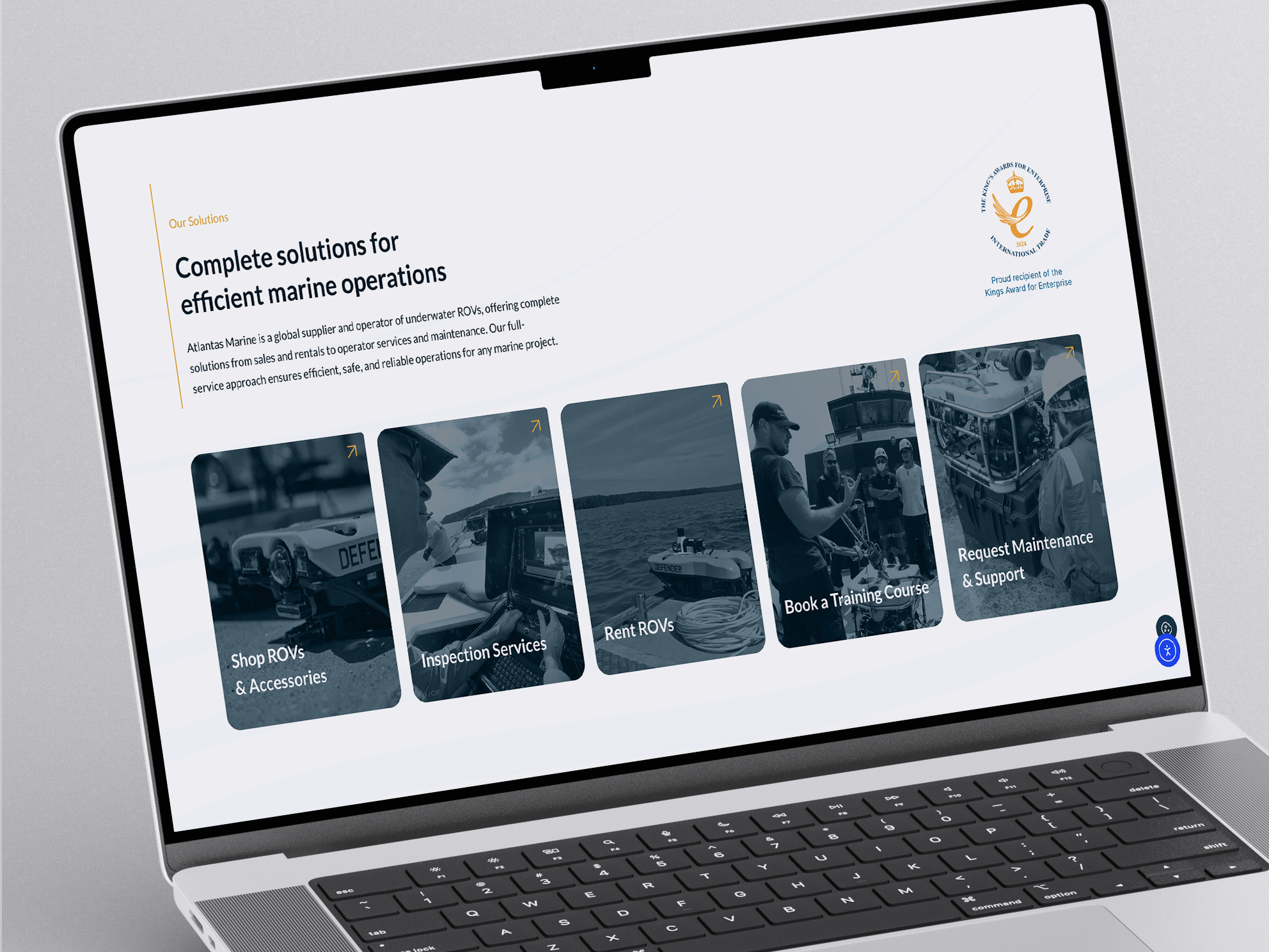 Atlantas Marine website solutions page on a laptop
